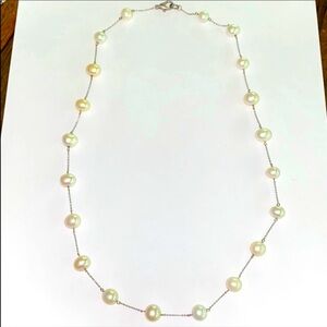 Pearl & Silver necklace 23 inches long Authentic pearls.